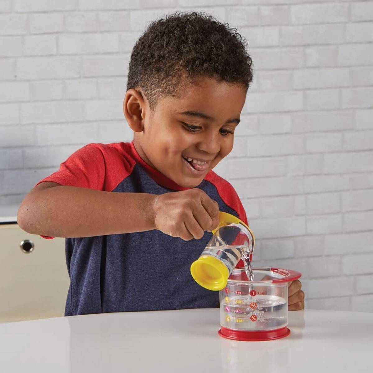 Learning Resources Rainbow Fraction® Liquid Measuring Cups - ABC School Supplies